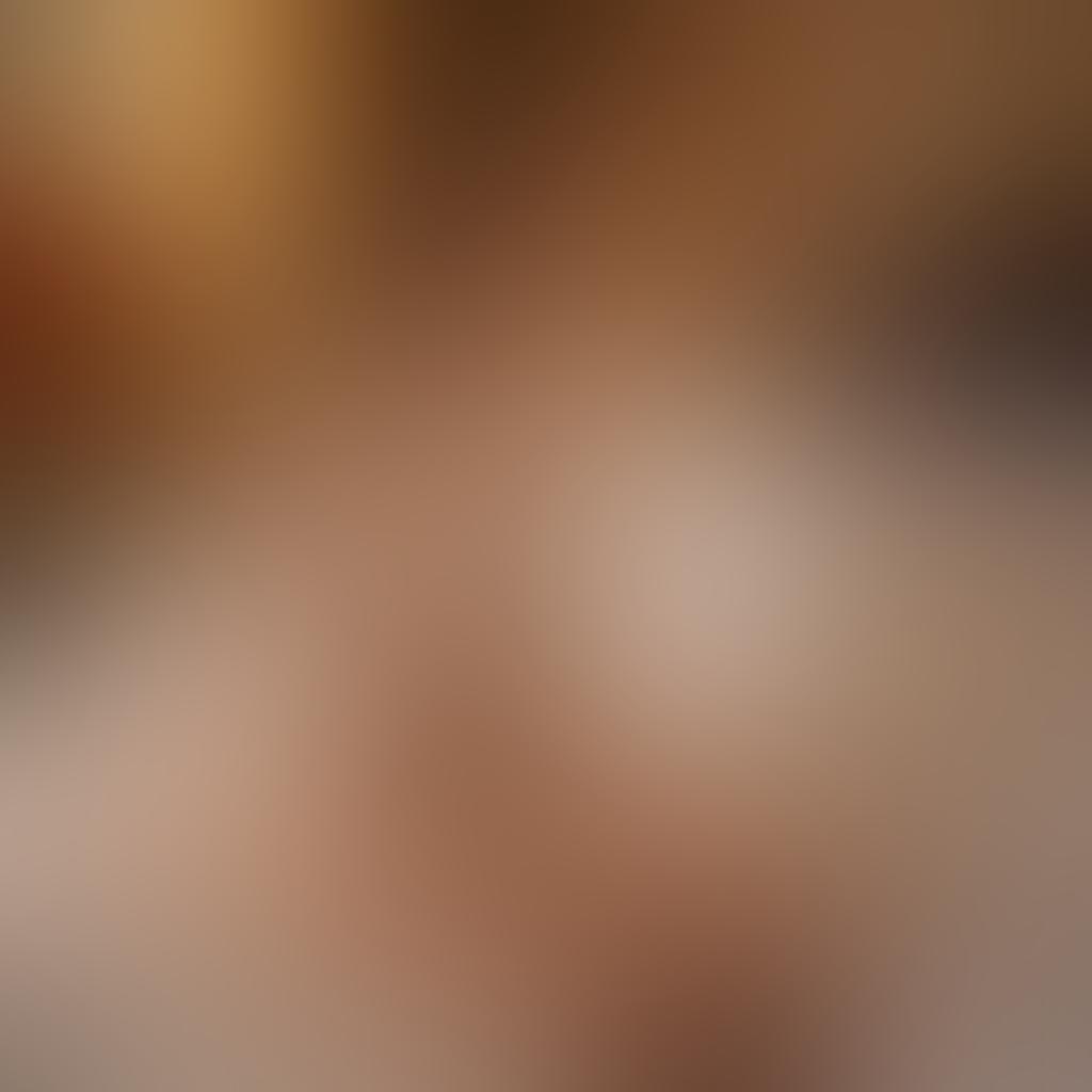 A glamorous, elegant woman with voluptuous curves, adorned in luxurious lingerie and accessories, exuding confidence and allure. Surround her with soft, ambient lighting that highlights her features and creates a celebratory atmosphere. Include tasteful elements like champagne flutes, silk sheets, and roses to enhance a sense of leisure and indulgence. The background should be a stylish boudoir with chic decor. super-realistic. vibrant colors. soft focus.